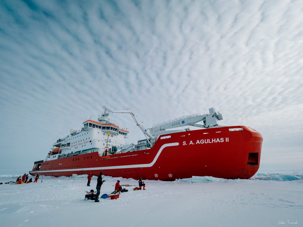 S.A. Agulhas II and crew members on pack ice | Endurance22